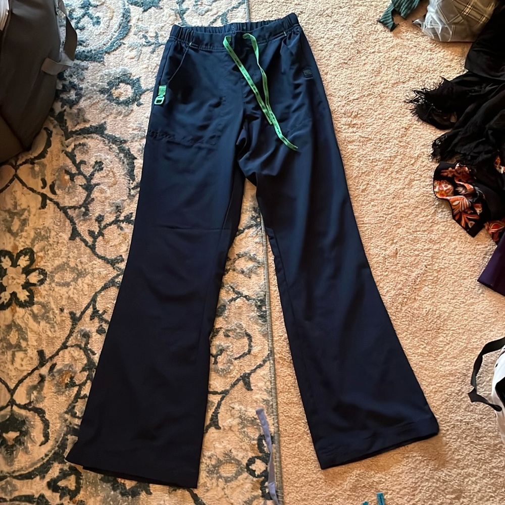 Navy scrub pants by carhartt size xs. Never worn.